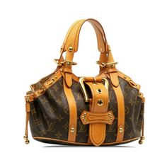 Product Details: Brown Louis Vuitton Monogram Theda PM Handbag. The Theda PM features a monogram canvas body, flat vachetta handles and trim, a flat strap with buckle closure, side drawstring closures, and an interior slip pocket. 5.9" L x 5.9" W x 3.3" D, 3.9" drop. Serial number FL0054. Condition: . Good.  Exterior Handle Creased, Scratched, . Exterior Handle  with Water Mark, Other. Exterior Corners . Exterior Top Cracked, Discolored, . Interior Lining  with Other. Interior Pocket  with Pen Mark. Lock Rusty/Tarnished, Scratched. Practical Attachment Rusty/Tarnished, Scratched.  Please note this is a  item that may display signs of wear consistent with the condition listed above and shown in photos. Designer Revival s this is an  Brown Louis Vuitton Monogram Theda PM Handbag   .   Please Water Mark, Lv Monogram, Exclusive Bag, New Bag, Monogram Canvas, Fashion Statement, Louis Vuitton Monogram, Bags Women, Luxury Bags