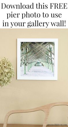 a wooden chair sitting next to a white vase with flowers on it and the text overlay reads, free pier photo to use in your gallery wall