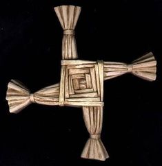 a wooden cross that has been carved to look like it is made out of wood