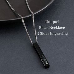 🖤Black Mens Necklace - The best gift for Him - Get a Vertical 3D Bar Engageable  Pendant for Dad with his kid's names on each 1-4 sides of the bar - Makes him the proudest daddy! * Laser Engraved necklace, features a black 3D bar pendant with a black curb chain made from high-quality stainless steel.  * You can choose 1-4 sides of any custom engraving: names, dates, coordinates, and more.  * This is a unique, customized Family gift for that remarkable man in your life!  ♥ S I Z E  &  M A T E R I A LS: ★ STYLE: Black 3D Bar Necklace ★ MATERIALS: Premium Stainless Steel ★ PENDANT SIZE: 40mm x 5mm ★ CHAIN STYLE: 3mm Black Chain ★ CHAIN LENGTH OPTIONS: Chain: 60cm / 23.6" ♥ H O W     T O     O R D E R: Please write your personalized engraving when placing your order.  ♥ G I F T I N G: All my Black Necklace For Birthday And Mother's Day Gift, Black Sterling Silver Jewelry For Father's Day, Black Stainless Steel Jewelry With Engraving Option, Minimalist Black Jewelry With Engraving Option, Black Jewelry With Engraving Option For Father's Day, Customizable Black Stainless Steel Necklaces, Minimalist Necklaces For Father's Day Personalized Gift, Black Laser Engraved Jewelry For Personalized Gift, Black Engraved Jewelry For Personalized Gift