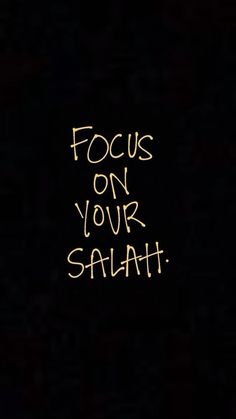 the words focus on your salah written in yellow chalk against a black background with an orange outline