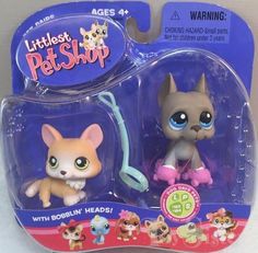 two littlest pet shop toys are in the package, one has a leash on it