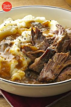 a bowl filled with meat and mashed potatoes