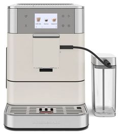 an espresso machine is shown with the coffee maker attached to it's side