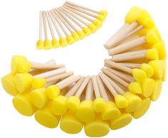 a bunch of yellow sponges are arranged in the shape of a circle on a white background