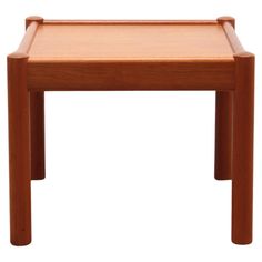 a small wooden table sitting on top of a white background