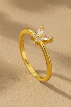 This simple skinny butterfly ring is a delicate and elegant addition to any jewelry collection. With its adjustable design, it can fit any finger size comfortably. Add a touch of whimsy and sophistication to your look with this beautiful ring. Adjustable Open Butterfly Ring For Promise, Adjustable Open Butterfly Promise Ring, Minimalist Adjustable Butterfly Ring, Adjustable Minimalist Butterfly Open Ring, Delicate Adjustable Butterfly Promise Ring, Dainty Adjustable Butterfly Promise Ring, Elegant Spring Butterfly Jewelry, Minimalist Adjustable Gold Butterfly Ring, Dainty Open Butterfly Ring For Promise