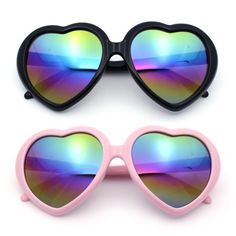 If you seek a genuinely iconic 70s hippie aesthetic, look no further than these revamped hippie heart shades. Their timeless design speaks for itself. Crafted with a premium plastic base and dazzling rainbow oil slick color mirror lenses made from 100% UV400 polycarbonate, these shades are the perfect accessory for any occasion. Whether you're heading to a music festival or a casual gathering, they'll elevate any outfit and are guaranteed to turn heads. (ss6219rv) Size: 5 3/4" (146mm) x 2 1/4" ( 70s Hippie Aesthetic, Heart Shape Sunglasses, Rainbow Mirror, Shape Sunglasses, Color Mirror, Hippie Aesthetic, 70s Hippie, Heart Shaped Sunglasses, Oil Slick