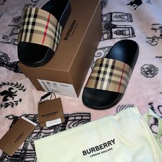 New Burberry Slides In Black In Classic Monogram Logo Excellent Condition - Never Used Size 37 - Fits A Us Size 6.5/7 Comes With Dust Bag And Box Retail Price Is $450 Open To Offers!!! Comes From A Smoke/Pet Free Home Burberry Slides, Burberry Sandals, Coach Slides, Cute Slides, Designer Slides, Pretty Sandals, Pretty Shoes Sneakers, Nike Shoes Jordans, Classic Monogram