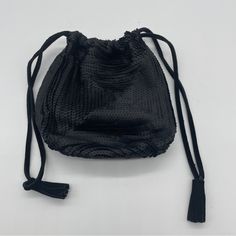 Pre-Owned Prada Bag/Purse! * Small Wristlet Style * Drawstring With 2 Black Suede Cords - Approx. 8" With Tassels * Approx. 5" Wide Opening When Extended; 6" Tall When Laid Flat; 3 1/2" Round Base * Black Matte Sequins Positioned In A Geometric Design - Refer To Photos * Lined In Black Fabric * Base Is Round * Excellent Used Condition * Comes From Pet-Friendly Home Very Unique Prada Bag! The Sequins Are Matte - Not Shiny - Classy, Elegant Wristlet! Goth Glamour, Small Wristlet, Suede Cord, Drawstring Pouch, Black Matte, Black Sequins, Prada Bag, Black Fabric, Geometric Design