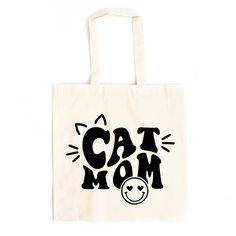 Looking for a cute tote bag to carry all your essentials this summer? This cute Cat Mom Smiley bag will be perfect to add to your collection. Perfect for a day at the beach or every day life! Playful Rectangular Bag With Cat Design, Playful Bags With Cat Design For Gifts, Playful Cat Design Bag For Gift, Playful Cat Design Bags As Gifts, Playful Cat Design Bag As Gift, Trendy Cat Design Bags For Gifts, Travel Tote Canvas Bag With Cat Design, Cute Tote Bag With Cat Design, Eco-friendly Tote Bag With Cat Design