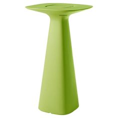 a small green table sitting on top of a white floor