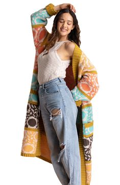 Patterned colorblocking brings boho appeal to this supersoft cardigan flanked by oversized patch pockets. Open front Long sleeves Front patch pockets Ribbed cuffs and hem 100% acrylic Hand wash, line dry Imported Multicolor Color Block Outerwear For Layering, Casual Long Patchwork Cardigan, Oversized Multicolor Color Block Outerwear, Oversized Multicolor Color Block Cardigan, Multicolor Open Front Patchwork Outerwear, Oversized Bohemian Cardigan With Pockets, Casual Multicolor Cardigan With Pockets, Bohemian Oversized Cardigan With Pockets, Multicolor Long Outerwear For Layering