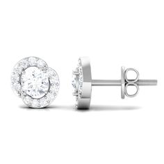 Product Details Make a statement with these dazzling halo stud earrings, featuring high-quality natural diamonds set in lustrous gold. The diamonds are carefully selected for their superior sparkle and brilliance, and are surrounded by a halo of smaller diamonds for added elegance. These diamond stud earrings are a timeless and versatile addition to any jewelry collection, perfect for adding a touch of glamour to any outfit. Product Information SKU SHP-EARRINGS032210245 Length 5.6 mm Width 5.4 m White Halo Cluster Earrings As Gift, White Halo Cluster Earrings For Gift, White Cluster Earrings With Halo Detail, Anniversary Halo Design Lab Grown Diamond Earrings, Diamond White Cluster Earrings With Halo For Gift, White Diamond Halo Earrings For Gift, Anniversary White Gold Cluster Earrings With Halo, Fine Jewelry White Gold Cluster Earrings With Halo, Anniversary White Gold Halo Cluster Earrings