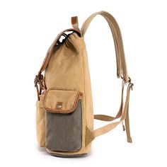 The Mountain Wood Backpack is perfect for an adventure-packed day or school day. Handcrafted using durable cotton canvas, genuine leather accents and nickle-free hardware..Material- vegetable base dyes, interior cotton lining, cotton canvas, genuine leather accents, hardware- alloy, or solid brass, copper.Small sized bag, 12' W x 18' H x 5' D.Handle drop- 3', strap drop- 24'.Drawstring closure.Interior- 1 padded laptop compartment with secure strap, 1 zipper pocket, 2 slip pockets, 2 pen or pencil slots.Exterior- 1 zipper pocket, 2 snap button pockets with flap, silver-tone.Weight- 1lb.Laptop compatible (std. size 13'-15').Clean your bag thoroughly before storing it, use a damp cloth for the exterior and brush out any dirt that has accumulated in the interior.Once your handbag is cleaned, Casual Khaki Leather Backpack For Travel, Outdoor Canvas Backpack, Casual Beige Backpack For Outdoor Activities, Outdoor Canvas Bag With Leather Trim, Outdoor Canvas Backpack With Adjustable Strap, Beige Leather Trim Backpack For Travel, Beige Backpack With Leather Trim For Travel, Canvas Backpack For Outdoor Activities With Pockets, Beige Standard Backpack For Outdoor