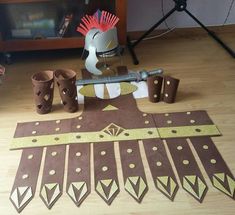 a table topped with lots of different types of crafts