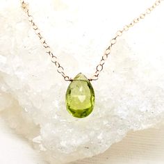 Sparkly Peridot briolette stone, suspended on a rose or yellow gold-filled or sterling silver chain. The perfect August gift for your special person. Worn alone or layered with your favorite chains. The light green color is just beautiful. genuine Peridot Approx. 1-carat+ 10 x 6 mm -sizes vary, most are larger Pear Briolette Light yellow-green (lime green) - varies Transparent with eye-visible inclusions Made to Order - Production time is 1-7 days depending on quantity Order :: select metal pref Teardrop Peridot Jewelry For May Birthstone, Teardrop Peridot Birthstone Jewelry, Peridot Briolette Gemstone Jewelry, Briolette May Birthstone Necklace, Yellow Gold Drop Necklaces For May Birthstone, Yellow Gold Drop Necklace For May Birthstone, Yellow Gold Peridot Teardrop Jewelry, Yellow Gold Briolette Necklace For May Birthstone, Yellow Gold Peridot Necklace Gift