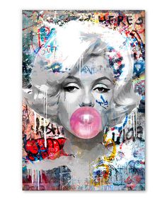 a painting of marilyn monroe with pink lips and graffiti all over it's face