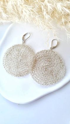 An Impressive African and Ethnic Style Big Round Flat Disc Earrings, Textured Silver Statement Earrings Level up your earring game with these, fashionable and striking Silver Boho Disc earrings. Stunning Silver disc earrings, boho style make a classic, elegant accessory suitable for any occasion. Large earrings, bold and statement give it extra presence and a special glamorous look.  These fabulous dangle earrings are handmade and crocheted by me from silver wire. These earrings feature a mesh t Bohemian Silver Round Bridal Earrings, Bohemian Silver Bridal Earrings, Silver Bohemian Bridal Earrings, Handmade Bridal Drop Earrings, Handmade Silver Drop Cluster Earrings, Silver Circle Earrings For Wedding, Handmade Silver Chandelier Earrings, Bohemian Handmade Silver Bridal Earrings, Bohemian Silver Bridal Earrings, Handmade