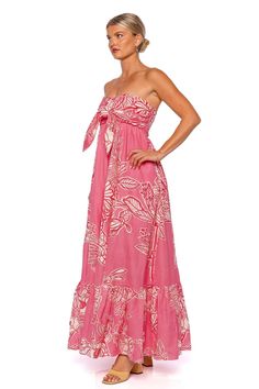 This strapless maxi dress features self-tie straps at the bust that can be knotted for a customized fit. Smocked back panel Optional adjustable shoulder strap attachments Side zip fastening 55% linen, 45% cotton Hand wash cold Strapless Maxi Sundress With Tie Straps, Pink Maxi Dress With Floral Print And Ruffled Straps, Strapless Pink Maxi Summer Dress, Feminine Strapless Pink Maxi Dress, Strapless Pink Floral Print Maxi Dress, Summer Clutch, Rachel Gilbert, Denim Jacket With Dress, Designer Clutch