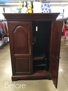 a wooden armoire with an open door