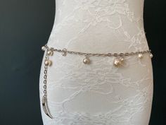 Handmade Silver Chain Belt with Pearl.  High Quality Pearl Drop Detail around this a chain Belt.  Choose your waist size in inches, all belts come with a 12 inch adjustable chain Elegant Adjustable Silver Chain Belt, Elegant Adjustable Chain Belt As Gift, Elegant Adjustable Chain Belt Gift, Elegant Silver Pearl Chain Waist Chain, Elegant Silver Waist Chain With Pearls, Elegant Silver Chain Belt, Adjustable Silver Beaded Waist Chain, Elegant Adjustable Beaded Waist Chain, Star Chain