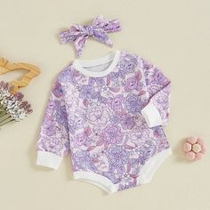 Includes: Onesie & BowMaterial: Polyester BlendGender: GirlsPattern: FloralSleeve Length: LongSummary: Baby Toddler Long Sleeve Floral Print Onesie with Matching Bow 2 Piece Set Fitted Long Sleeve Onesie For Spring, Playful Long Sleeve Onesie For Summer, Playful Long Sleeve Summer Onesie, Cute Long Sleeve Summer Onesie, Printed Playwear Sets For Spring, Cute Purple Spring Sets, Playful Cotton Onesie With Floral Print, Pink Cotton Onesie With Floral Print, Long Sleeve Printed Onesie For Summer