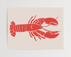 a red lobster on a beige background