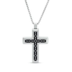 This men's stepped edge cross pendant crafted in stainless steel features a black resin geometric pattern inlay. The design suspends along a 24.0-inch box chain that secures with a lobster claw clasp. Black Engraved Cross Jewelry, Black Engraved Crucifix Necklace, Black Crucifix Necklace Engraved, Black Engraved Pendant Cross Necklace, Black Engraved Cross Necklace Gift, Engraved Black Cross Necklace As Gift, Gift Black Engraved Cross Necklace, Engraved Black Cross Necklace For Gift, Black Engraved Cross Pendant Necklace