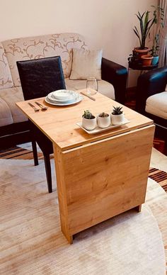 a living room with two couches and a coffee table in it's center