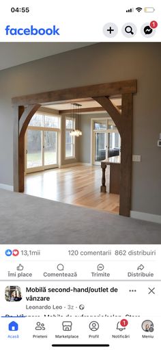 an open room with wooden beams and windows on the wall, in front of a facebook page