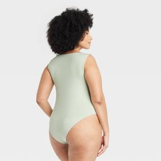 Elevate your dressing style with this Slim-Fit Boat Neck Bodysuit from A New Day™. This solid-color sleeveless bodysuit features a simple boat neck and a slim-fit silhouette. Made from thick jersey fabric with added stretch, it provides a comfortable and flexible fit, and the adjustable crotch snaps make for easy, customized wear. You can coordinate it with different bottoms and match with layering pieces to create a range of versatile styles. A New Day™: Style that goes wherever you do. Sleeveless Second-skin Green Bodysuit, Sleeveless Green Second-skin Bodysuit, Sleeveless Tight-fitting Green Bodysuit, Simple Boat, Dressing Style, Sleeveless Bodysuit, Womens Clothing Sizes, Layering Pieces, Body Measurements