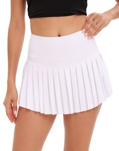 PRICES MAY VARY. Our womens tennis skirt features inner shorts for added comfort and coverage while playing on the court. The inner side pocket allows you to conveniently store small items like keys or cards during your game. The pleated design adds a touch of femininity and style to your outfit. With a high-waisted design, our tennis skirt not only provides tummy control and support but also offers a flattering fit that accentuates your waistline. The high-waisted feature ensures the skirt stay Golf Skorts, Golf Skirts, Golf Skort, Womens Tennis, Confidence Boost, Tennis Skirt, Skorts, Pickleball, Athletic Women