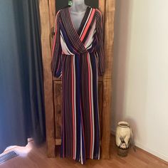 Express Colorful Striped Jumpsuit Size Xs Will Fit Small Too See Measures Below Colorful And Fun Striped Gives It A Retro Flare For Sure! 1960's To 70's Vibe With Wide Legs For Maximum Comfort Colors Are Black, Pink, Orange, Blue, White Has Built In Full Cami All The Way Down To Bottom Of Legs This Is Semi Sheer Some Stretch: 100% Polyester Measures Flat: Across Shoulders 14" No Stretch There Ptp: 16.75" 11" Waist Stretch To 16" + Total Length Shoulder To End Is 60" Inseam 30.5" Part Of That Num Multicolor Jumpsuits And Rompers For Spring Workwear, Multicolor V-neck Jumpsuit For Night Out, Multicolor Long Sleeve Jumpsuits And Rompers For Night Out, Multicolor Long Sleeve Jumpsuit For Night Out, Chic Multicolor Jumpsuits And Rompers For Work, Chic Multicolor Workwear Jumpsuits And Rompers, Chic Multicolor Jumpsuits And Rompers, Striped Jumpsuit, Wide Legs