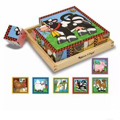 a wooden box with two puzzles in it and one has a cow on it