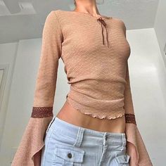 Vintage Tan & Brown Knit Suede Tie Longsleeve Top With Flared Sleeves And Trim Around Wrist. This Top Is Truly Amazing And Reminds Me Of Iconic 70’s Boho/ Hippie Style. I Love It So I’m Accepting Reasonable Offers Not In A Rush To Sell. *****Please Read- Top Is Missing Content Tag & May Have Minor Pulls Due To Age. The Photos Where They’re More Fitted I Tied In Back For Pics.****** Best Fits Small Unless Tied In Back It Would Fit Xs As Well. #Boho #Coastalcowgirl #Coquette #Cottagecore #Fairycor Fitted Long Sleeve Pointelle Knit Top, Spring Pointelle Knit Long Sleeve Tops, Spring Long Sleeve Pointelle Knit Tops, Fitted Pointelle Knit Long Sleeve Tops, Fitted Knit Top With Long Sleeves For Summer, Fitted Long Sleeve Knit Top For Summer, Fitted Long Sleeve Beige Top For Fall, Spring Knit Long Sleeve Top, Fitted Beige Knitted Tops