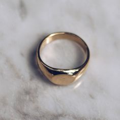 Gold toned brass Small Minimalist Ring in sizes for both men and women. This simple ring has a circular flat face but lot's of style and flat top rings are definitely in right now! Available in 925 Sterling Silver https://etsy.me/2sLAcwj Available in Larger Style https://etsy.me/2CEYcpw Ring Size Available in all sizes. Please be sure to find your exact ring size for the finger you want before ordering. See image chart above or you can use the chart on my website as a guide - https://jewelrylab. Flat Top Ring, Mens Pinky Ring, Ring Minimal, Face Ring, Flat Face, Minimal Ring, Simple Ring, Top Rings, Ring Mens