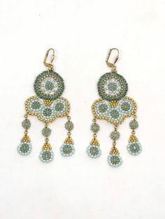 two pairs of beaded earrings with dangling drops