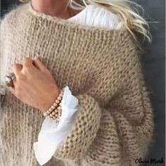 Olivia Mark - Stylish and Casual Knitted Sweater for Fashionable Knitwear Enthusiasts Fall Acrylic Knitting Pattern, Cozy Solid Color One-size Sweater, One Size Beige Sweater For Layering, Beige Knitted Long Sleeve Tops, Beige Long Sleeve Knitted Top, One Size Beige Soft Knit Sweater, Long Sleeve Acrylic Knitted Sweater, Long Sleeve Beige Knitting Pattern, Beige Long Sleeve Knitting Pattern