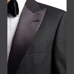 Brunello Cucinelli tuxedo in solid wool-silk blend. Peaked satin lapel; two-button front. Basted sleeves. Three front welt pockets. Double vent. Includes matching flat-front trousers. Virgin wool/silk. Made in Italy. Classic Tuxedo With Notch Lapel And Custom Fit, Custom Fit Notch Lapel Tuxedo For Formal Events, Formal Tuxedo With Notch Lapel, Tuxedo With Hidden Button Closure And Notch Lapel, Custom Fit Single Breasted Tuxedo, Formal Custom Fit Tuxedo With Suit Collar, Custom Fit Tuxedo With Suit Collar For Formal Occasions, Single Button Tuxedo For Black Tie Events, Tuxedo With Pressed Crease For Black Tie