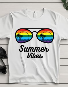 Summer, Summer tshirt, Sunset, Summer gift, Summer lover, Summer vibes, Cool summer tshirt, Funny summer tshirt, Rainbow, Glasses tshirt, Sunset This is the perfect top for a summer lover. Everything in the shop is made to order so if you want a different colour or size please contact me! Materials:   All top's are made from soft materials, this tee is 100% cotton for solid colours. Sports grey includes polyester (90% cotton, 10% polyester.) Features: -twill tape   -no side seams -The collar is Trendy Rainbow Print T-shirt For Summer, Summer Rainbow Print Crew Neck T-shirt, Trendy Rainbow Summer T-shirt, Trendy Rainbow T-shirt For Summer, Rainbow Letter Print Summer Top, Rainbow Letter Print Top For Summer, Rainbow Letter Print Tops For Summer, Summer Rainbow Short Sleeve T-shirt, Summer Graphic Tee With Rainbow Print