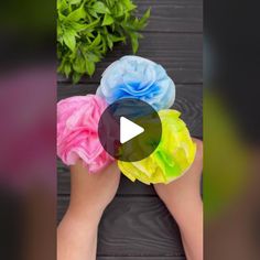 the video shows how to make tissue paper flowers