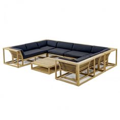 an outdoor furniture set made out of wood and blue cushions, including a sectional sofa