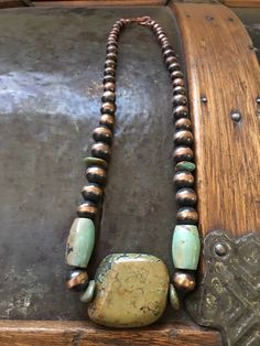 Turquoise and Copper Bead Necklace by LaurelsBasket on Etsy https://www.etsy.com/listing/577516588/turquoise-and-copper-bead-necklace Green Artisan Necklace With Patina, Artisan Green Necklace With Patina, Artisan Green Turquoise Necklace With Patina, Bohemian Green Turquoise Necklace With Patina, Unique Green Turquoise Necklace With Large Beads, Artisan Brown Turquoise Necklace Hand-strung, Unique Green Turquoise Necklace With Polished Beads, Octopus Necklace, Bee Necklace