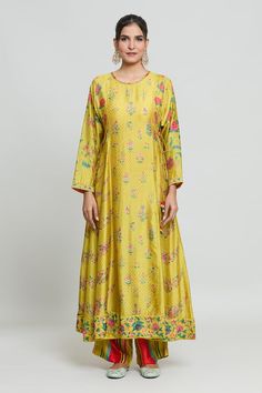 Mustard yellow kurta with floral print. Paired with a striped palazzo. - Aza Fashions Traditional Palazzo Set With Digital Print For Spring, Yellow Dress With Digital Print For Festive Season, Festive Yellow Dress With Digital Print, Yellow Palazzo Set With Printed Motifs For Spring, Yellow Long Sleeve Palazzo Set For Eid, Festive Spring Palazzo Set Maxi Length, Yellow Silk Sets For Spring, Spring Festive Maxi Length Palazzo Set, Yellow Straight Kurta For Spring