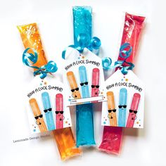 four packaged candy sticks with sunglasses on them