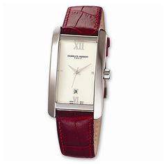 The rectangular champagne dial with chrome hands and markers stands out against the stainless steel case and the red leather strap creating a sharp, retro style you will love to wear again and again. This Charles-Hubert watch features a scratch resistant mineral crystal, a square date window, a Japanese Quartz movement for precision timekeeping and is water resistant up to 100 feet (30 meters). It also includes a custom gift box along with a lifetime movement warranty and a one-year warranty aga Affordable Watches, Retro Watches, Bow Jewelry, Color Champagne, Jewelry Companies, Watch Movement, Black Bow, Stainless Steel Watch, Classic Collection