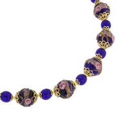 This classic and elegant Venetian glass necklace features a combination of simple small transparent beads in the shades of navy blue and larger exquisite beads adorned by raised decorations on the outside created in ancient Fiorato technique. This necklace is a shimmering work of art hand-made by Murano glass masters who have been perfecting their skills for generations. Wear it to demonstrate your unique style and discerning taste. Measurements: The necklace measures 16 inches in length and the Elegant Blue Faceted Beads, Elegant Royal Blue Round Beads Necklace, Elegant Royal Blue Round Bead Necklaces, Elegant Royal Blue Round Beaded Necklace, Elegant Blue Necklace With Round Beads, Elegant Royal Blue Beaded Necklaces With Round Beads, Elegant Royal Blue Beaded Necklace With Round Beads, Elegant Large Blue Beads, Elegant Blue Large Beads