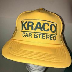 Vintage Kraco Car Stereo Trucker Hat 1970s 1980s Yellow Snapback Cap Vintage Kraco Car Stereo Trucker Hat 1970s 1980s Yellow Snapback Cap Vintage Kraco Car Stereo Trucker Hat 1970s 1980s Yellow Snapback Cap Vintage Kraco Car Stereo Trucker Hat 1970s 1980s Yellow Snapback Cap Kraco Car Stereo Hat Trucker Hat Very rare! From the 1970s! Vintage Snap Back Cap MATERIAL: Polyester & Nylon SIZE: One Size Fits All (snapback strap) CONDITION: Has a few small dark spots on bill, but they look like they co Retro Dad Hat With Curved Brim, Retro Snapback Dad Hat, Retro Flat Brim Hat, One Size Fits Most, Vintage Adjustable Trucker Hat Snapback, Vintage Adjustable Snapback Trucker Hat, Retro Baseball Cap With Curved Brim, Vintage Adjustable Snapback Hat With Curved Brim, Retro Fitted Hat With Flat Bill, Retro Snapback Fitted Hat