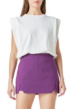 Padded shoulders lend plenty of drama to a sleeveless top completed by a ribbed waist. Crewneck Sleeveless, with padded shoulders 60% rayon, 30% nylon, 10% polyester Hand wash, dry flat Imported Blouson Top, Sleeveless Top, Hand Wash, Drama, Nordstrom, Off White, Crew Neck